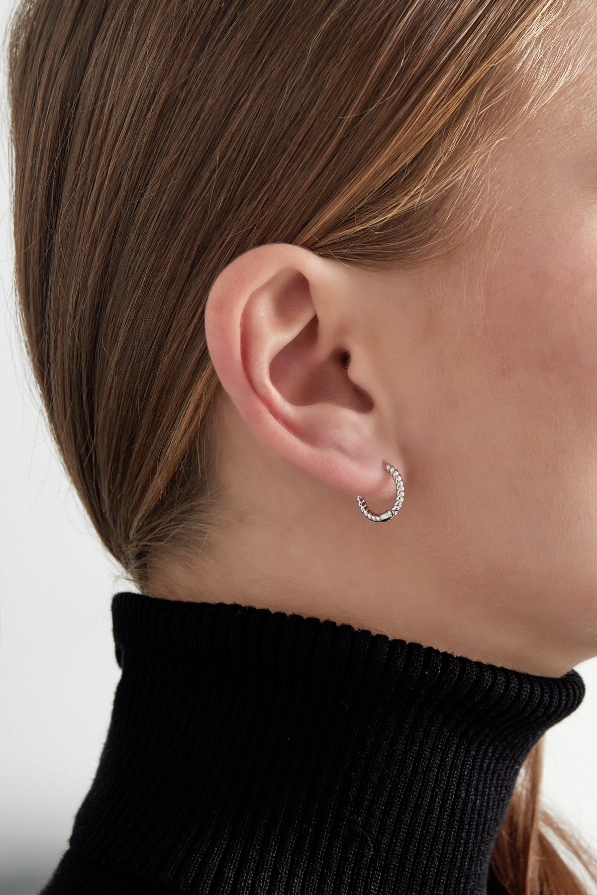 Tidlösa twist örhängen